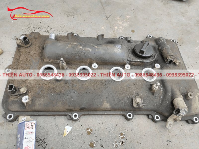 Nắp cò - Nắp máy được tháo ra để thay gioăng nắp dàn cò