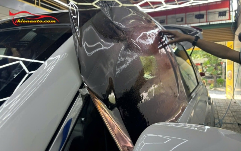 Dán phim cách nhiệt Helioz full xe trong combo độ xe Limo Green tiêu chuẩn