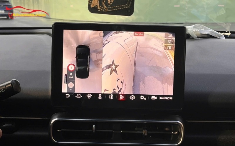 Car dashboard display showing camera view